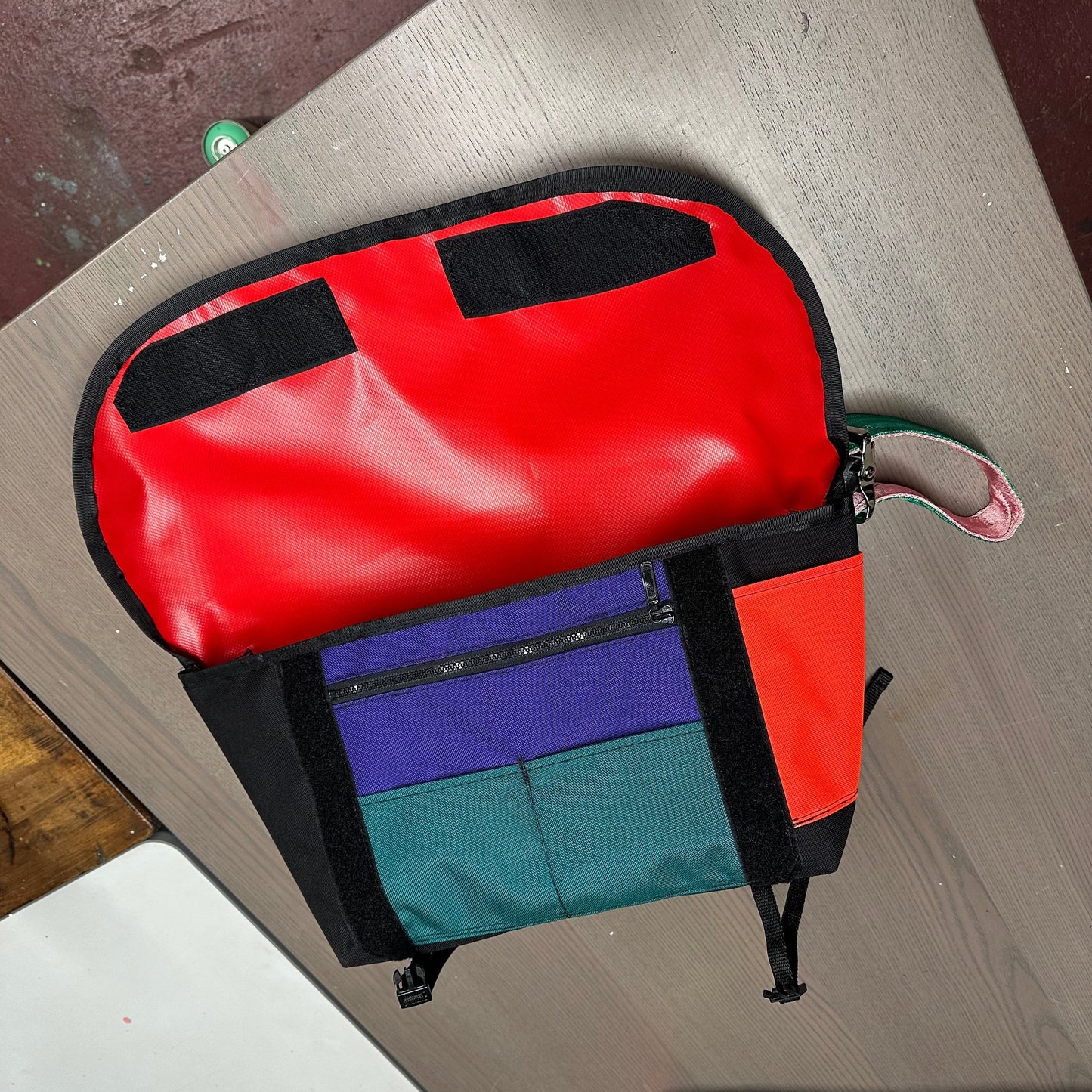 Wider small sling bag in black