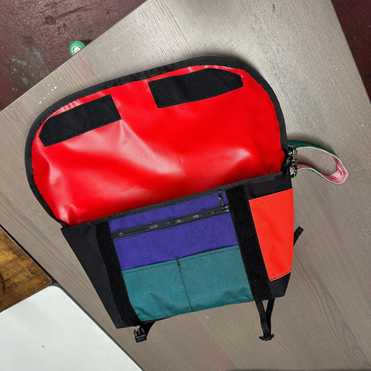 Wider small sling bag in black